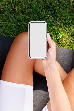 Hand Holding Smartphone with Blank White Screen. Mockup