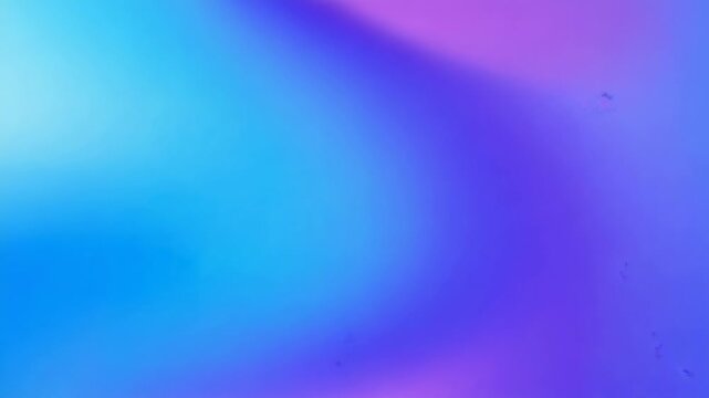 Showing color wash slowly shifting hues on screen as backdrop with dark specks on play starting