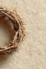 Fototapeta premium Crown of thorns on beige background for Easter-themed decoration