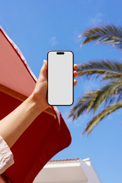 Smartphone Mockup with White Screen Under Blue Sky Sunny Vacation