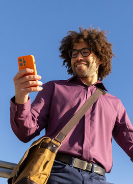 Casual  Portrait black guy cell phone 