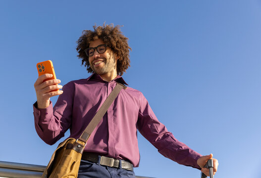Confident handsome  Portrait black guy cell phone 