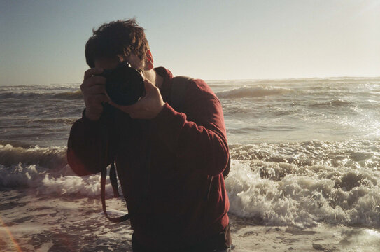 Photographer by the Ocean Waves on 35mm Film