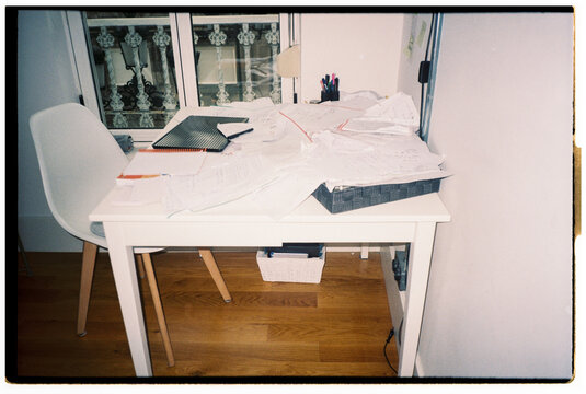 Desk Clutter With Papers