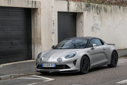 Nancy, France - December 6th 2025 : View on a matte grey Alpine A110 S Enstone Edition parked on a street.