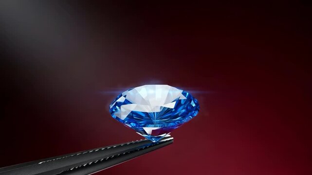 Faceted blue sapphire gemstone jewel held by tweezers sparkling with dramatic lighting