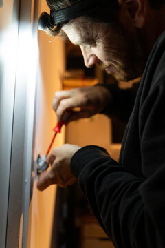 Electrician Installing Wall Socket