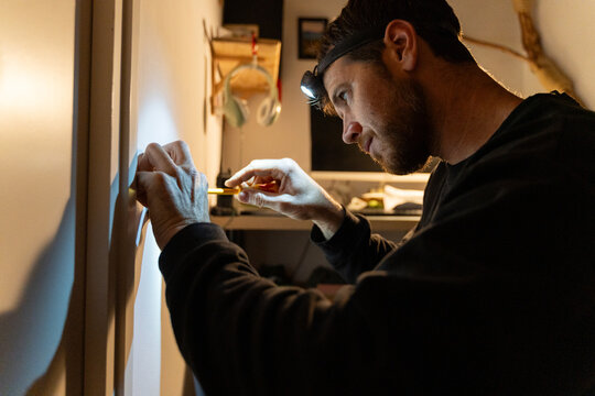 Electrician Installing Wall Socket