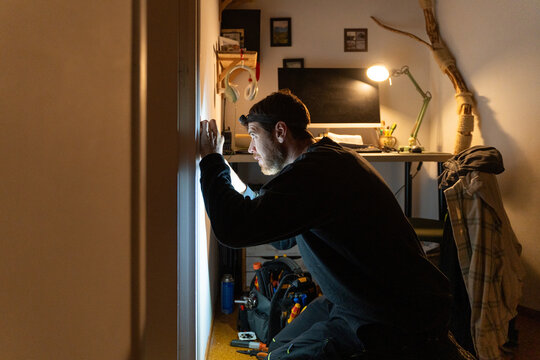 Electrician Installing Wall Socket