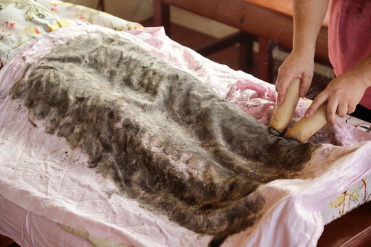 Closeup of an elderly Chinese man receiving moxibustion therapy
