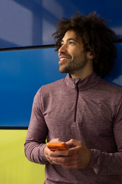 Smile Portrait black athlete cell phone texting