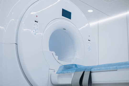Medical CT, MRI or PET in a modern hospital laboratory. Technologically advanced and functional medical equipment in a clean white room. Medical Equipment and HealthCare. High quality photo. Nobody.