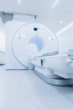 Medical CT or MRI Scan in the modern hospital laboratory. Interior of radiography department. Technologically advanced equipment in white room. Magnetic resonance diagnostics machine. Advertising