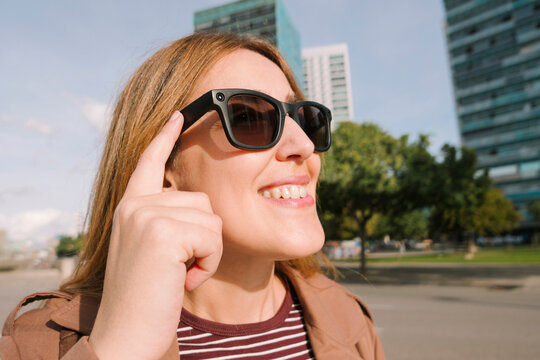 Woman using smart glasses