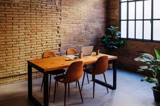 Modern office with industrial brick wall