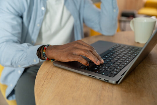 Person typing on laptop working from home