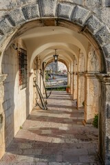 Long Arched Corridor in Historic Stone Building