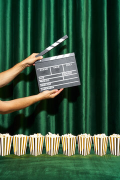 Movie Clapperboard and Popcorn Boxes with Green Curtain