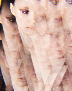 Kaleidoscopic illusion with the face of a girl.