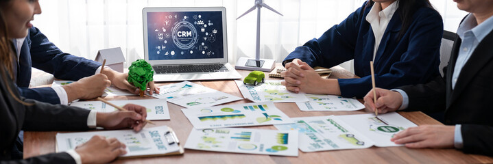 Naklejka premium Customer relationship management system on brisk computer for CRM business and enterprise