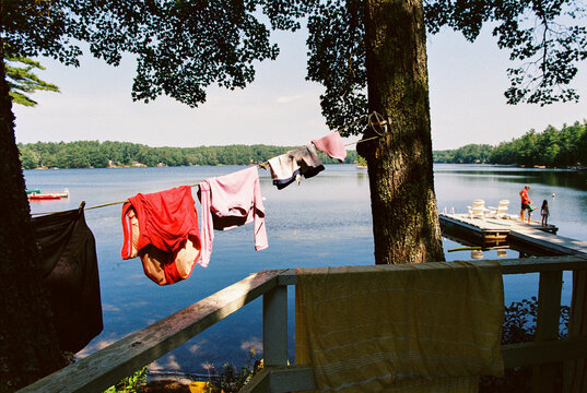 Family spends time together on a summer vacation at the lake