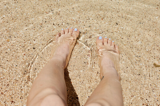 Barefoot Calm on Sandy Beach at Golden Hour