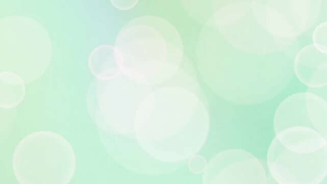 A serene and dreamy scene of blurred circles in soft focus, evoking a sense of calmness and tranquility