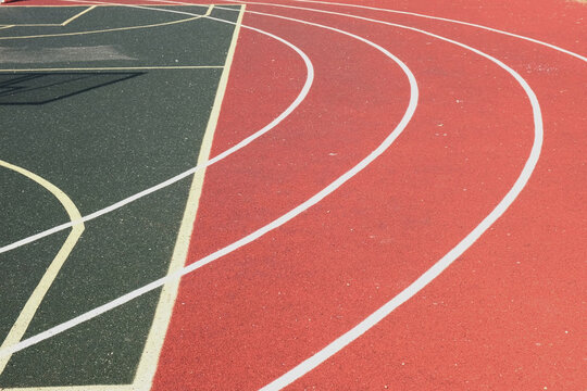 Sport floor. Interior of empty modern indoor sport court, coating Crumb rubber flooring, artificial. Sports surface with different marking lines. Recycled rubber Athletic field. Run track markup. 4K