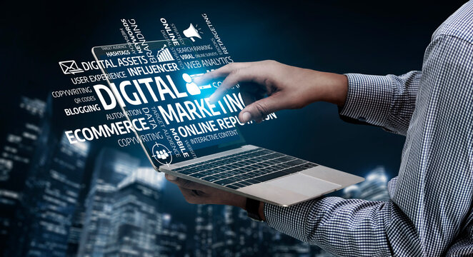This image showcases a hand interacting with a laptop, surrounded by various terms related to digital marketing. It symbolizes the dynamic landscape of online business strategies. Tessel