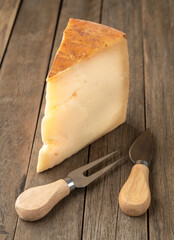 Parmesan cheese over wooden table