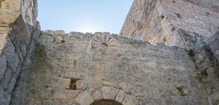 Ancient Stone Archway of a Historical Ruin in Demre, Turkey, Framed by Weathered Walls and Sky