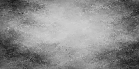 Obraz premium A dark grunge black and white abstract texture featuring moody smoke and mist swirling through a stormy night sky with clouds and moonlight