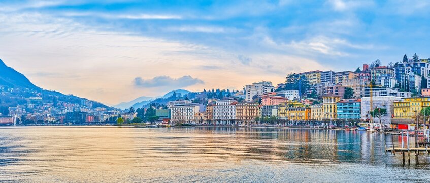 Scenic panorama of Lake Lugano and waterfront buildings in Lugano, Switzerland