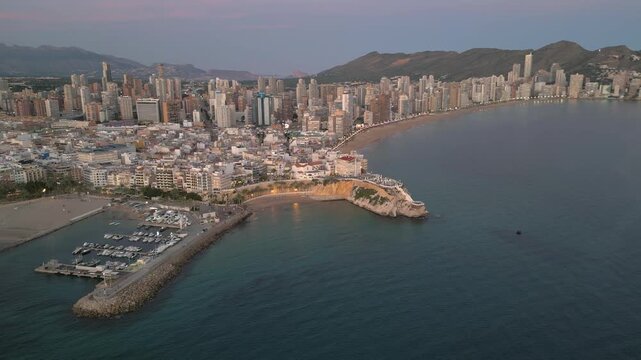 Aerial view of benidorm cityscape at sunset
