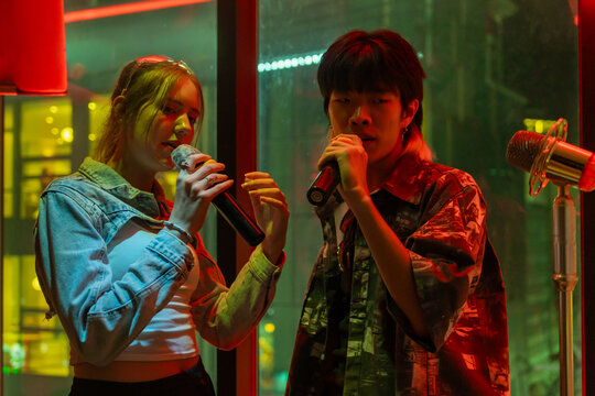 Young Performers Showcase Their Talent in Vibrant Karaoke Setting