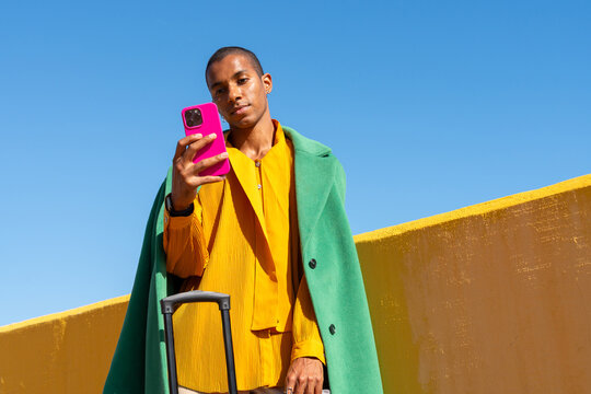 Traveler Checking Phone Outdoors