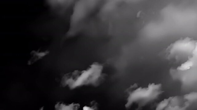 Cloud transition with alpha channel. A cloud moves across the frame, fully covering the screen before revealing the next scene.