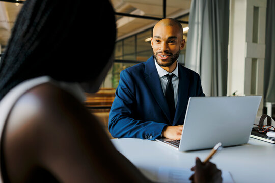 Man in elegant suit having business meeting in office