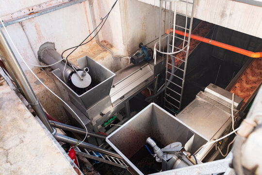 Industrial Machinery Inside a Processing Plant in Operation in Winery