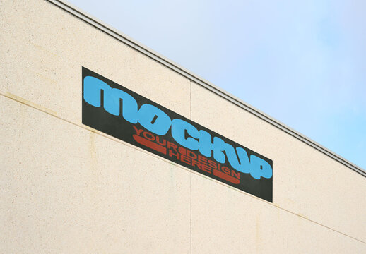 Real photo of Warehouse Sign Mockup on Facade Wall. PSD mockup.