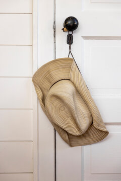 Cowboy hat  hang closet  in bedroom 