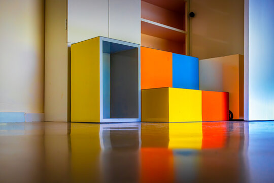 Colorful Bauhaus furniture detail inside Haus am Horn, Weimar, Germany - geometric interior design elements in a UNESCO World Heritage Bauhaus site.