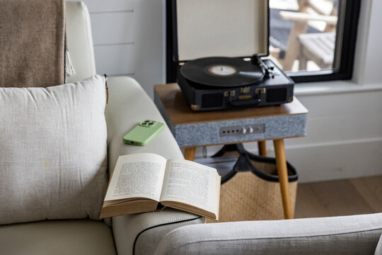 Residential Home with turntable couch book mobile phone