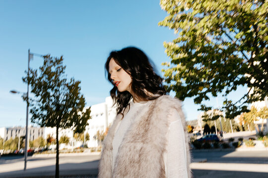 Woman with motion blur on street