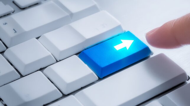 Person presses blue button on computer keyboard close up of hand pressing prominent blue button on keyboard