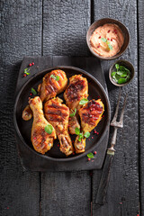 Crispy grilled chicken leg as healthy summer appetizer.