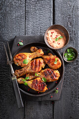 Crispy grilled chicken leg as summer snack for bbq.