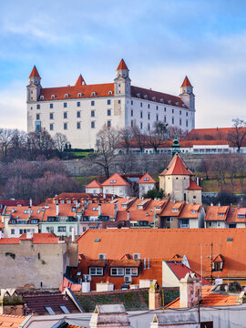 Bratislava Castle Facade Above Historic Red Tiled City Rooftops