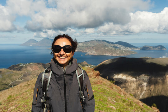 Smiling Hiker on Hilltop