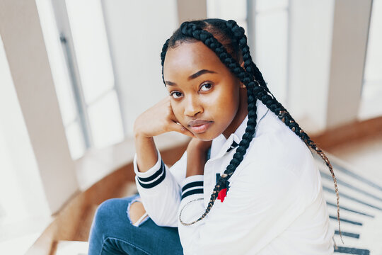 Portrait of an African Woman On a Spiral Staircase